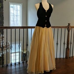 A black and gold Te Rez dress in a size 6